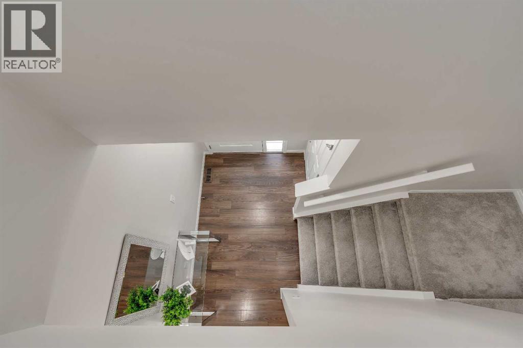 Photo 24 of 147 Osborne Rise Sw, Airdrie AB