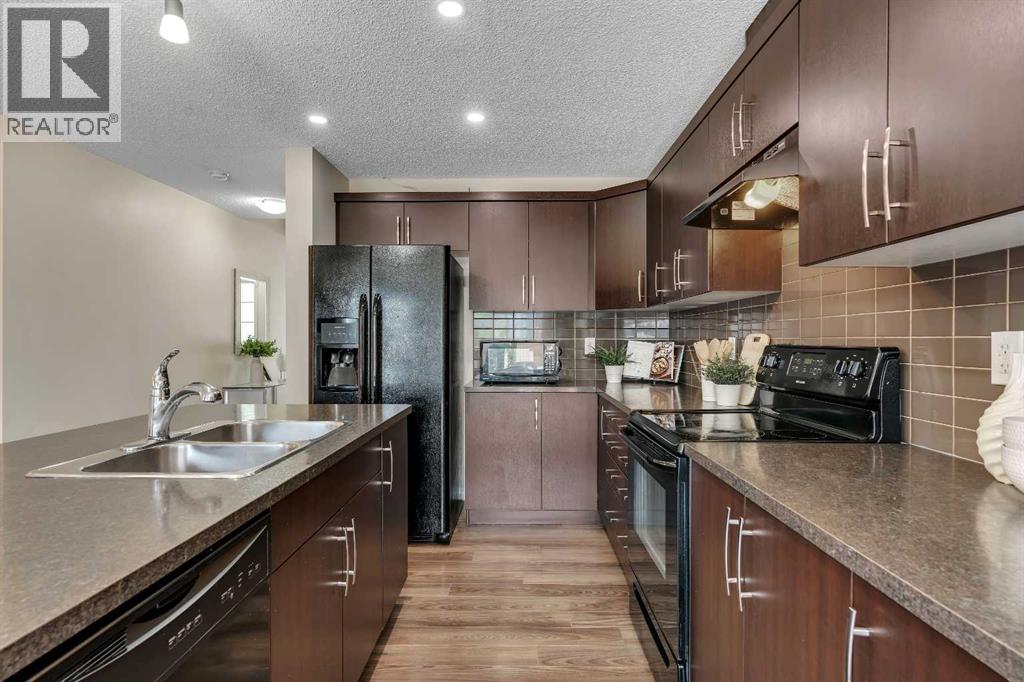 Photo 16 of 147 Osborne Rise Sw, Airdrie AB