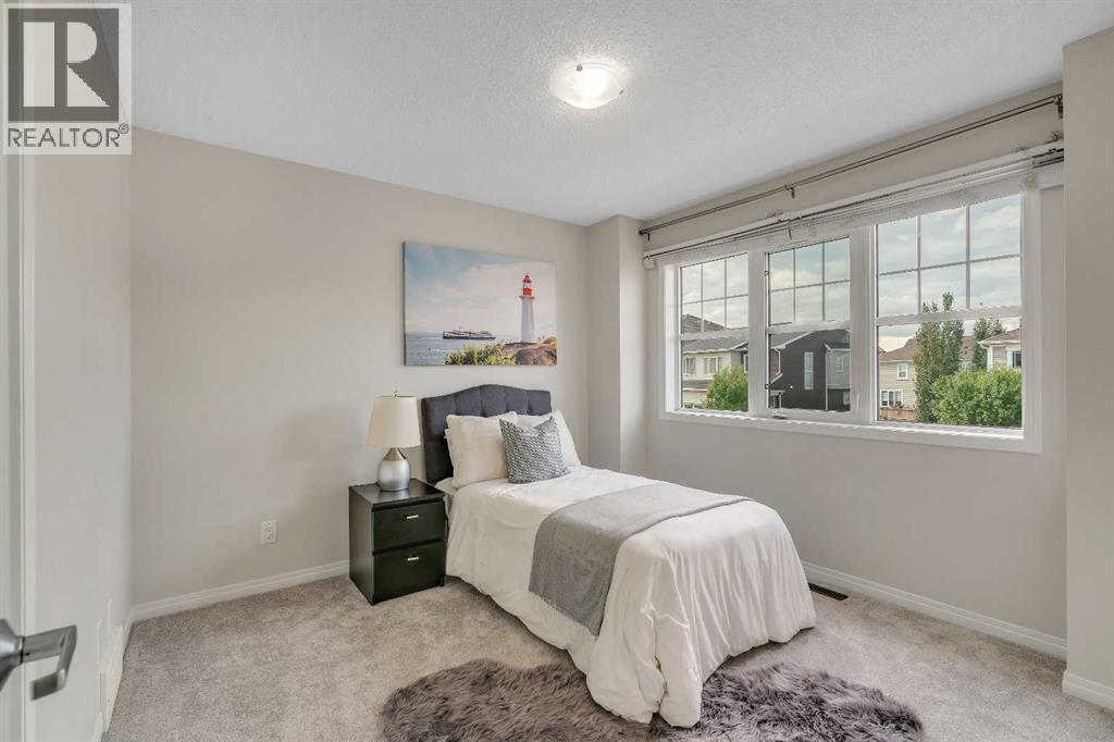 Photo 37 of 147 Osborne Rise Sw, Airdrie AB