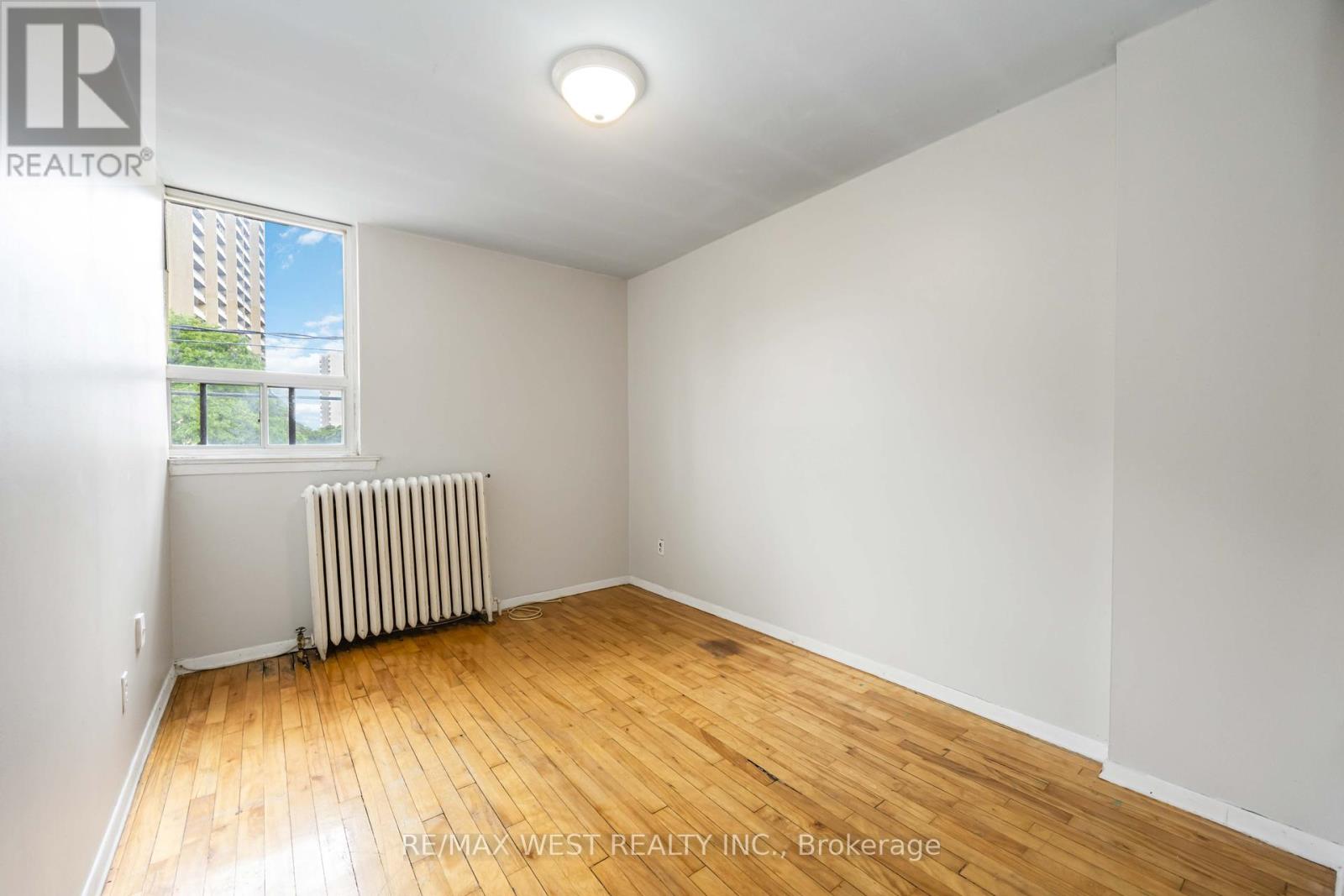 Photo 9 of 4990 Dundas Street W, Toronto ON