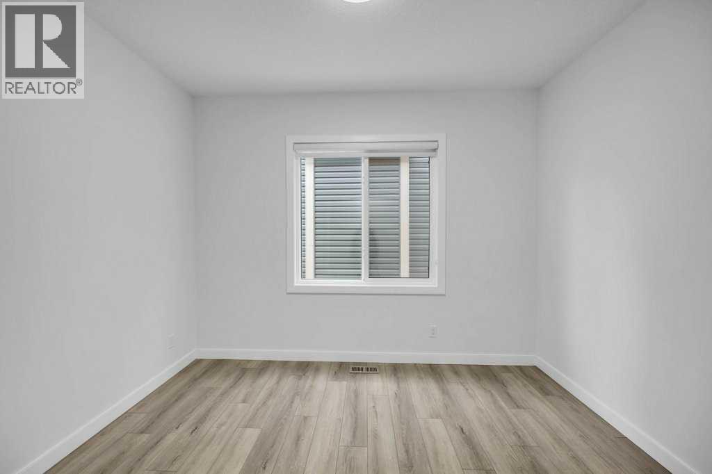 Photo 9 of 1098 Midtown Avenue Sw, Airdrie AB