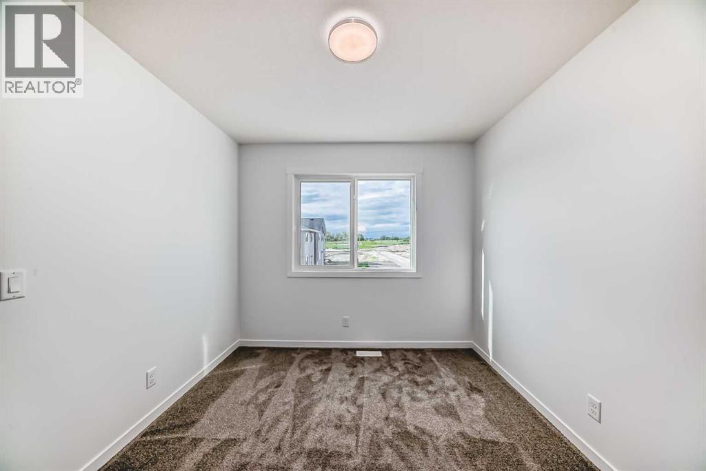 Photo 25 of 72 Wedderburn Drive, Okotoks AB