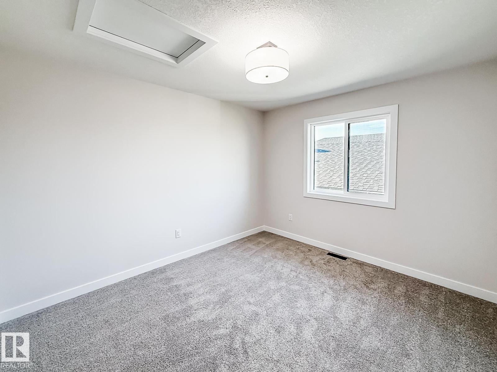 Photo 32 of 8501 87 St, Grande Prairie AB