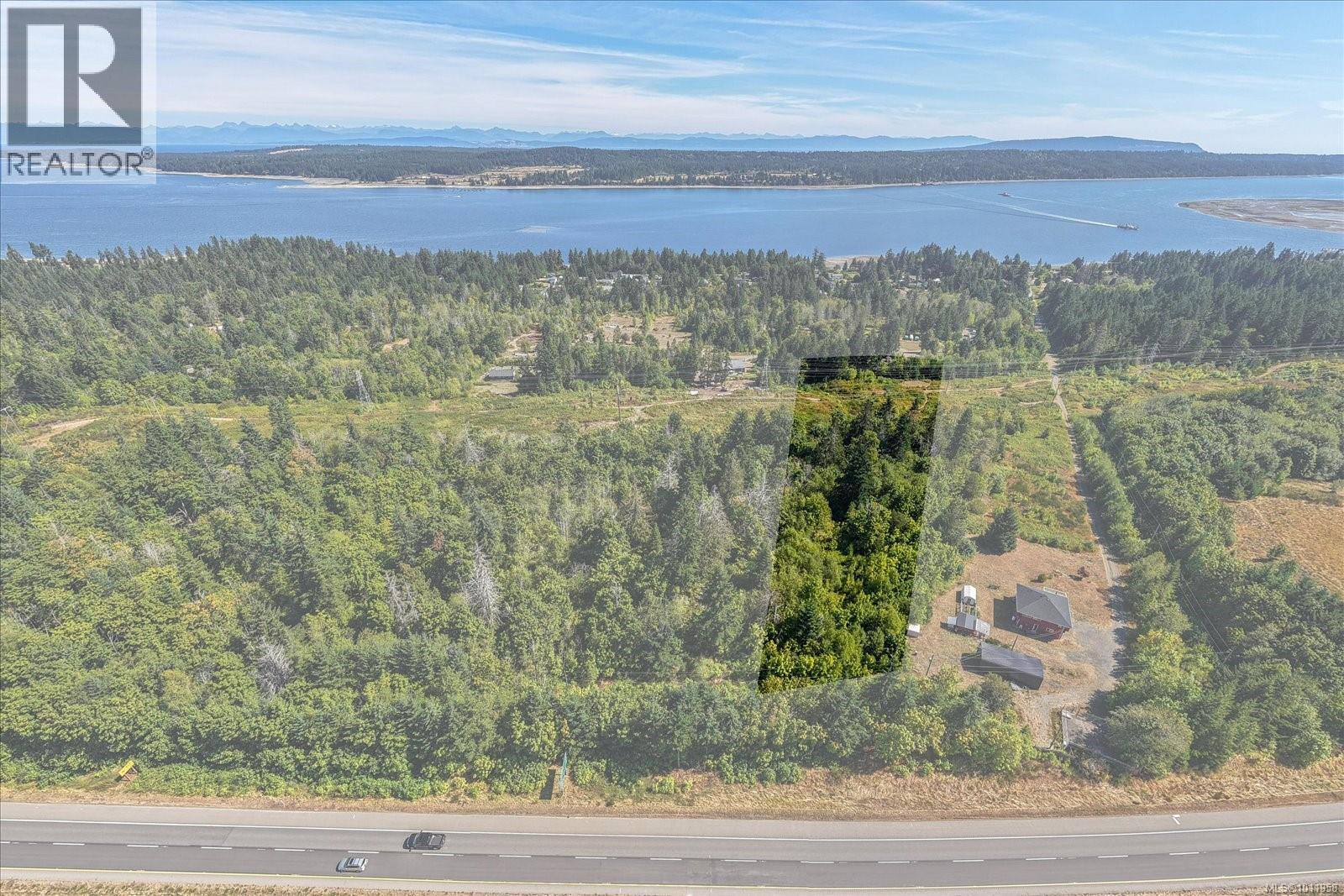 Photo 2 of 6593 Country Rd, Fanny Bay BC