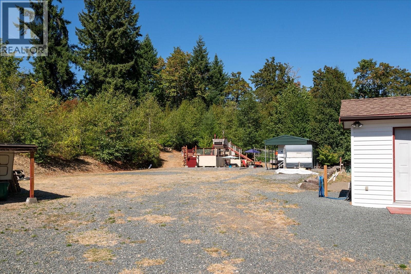 Photo 10 of 6593 Country Rd, Fanny Bay BC