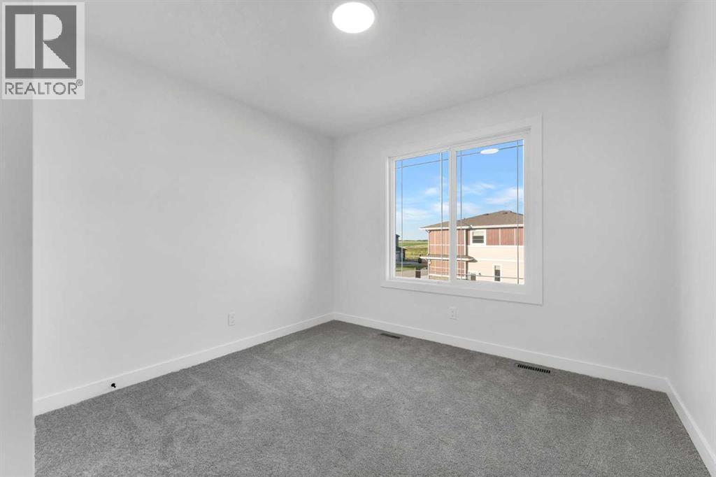 Photo 31 of 106 Sunstone Way, Balzac AB