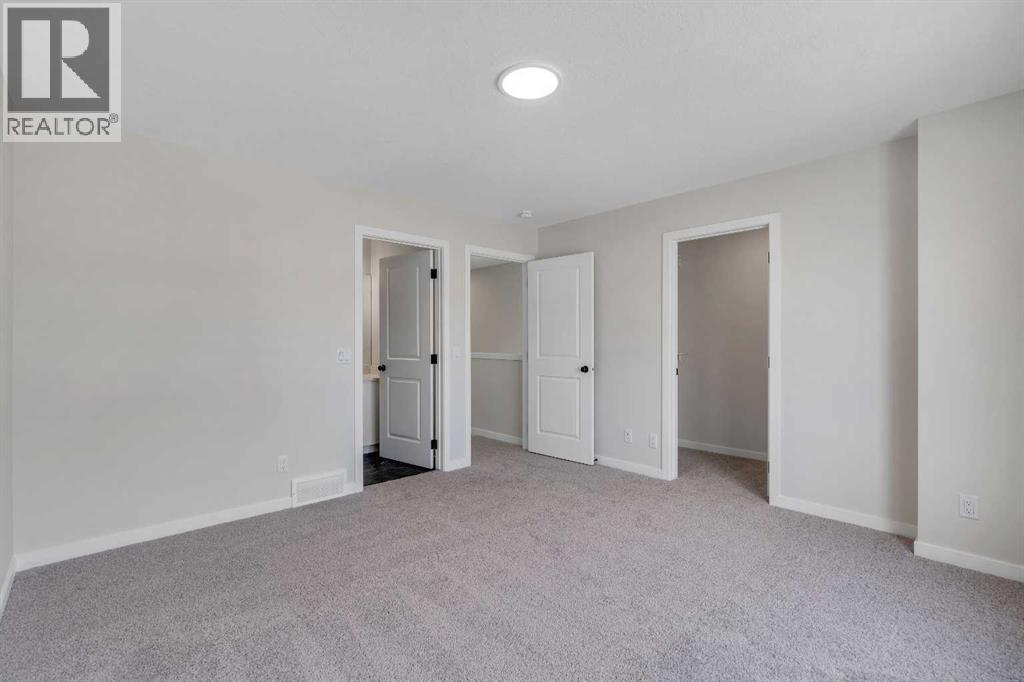 Photo 21 of 225 Heirloom Way Se, Calgary AB