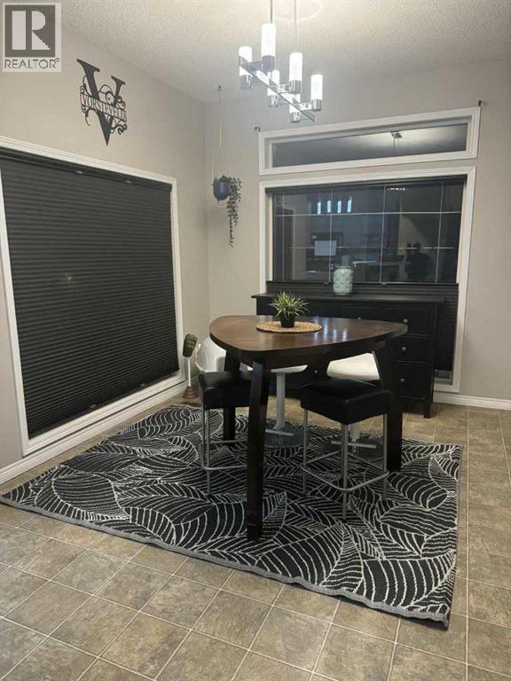 Photo 10 of 148 Stonegate Crescent Nw, Airdrie AB