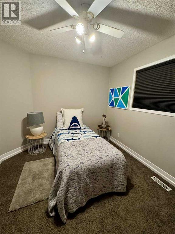 Photo 24 of 148 Stonegate Crescent Nw, Airdrie AB