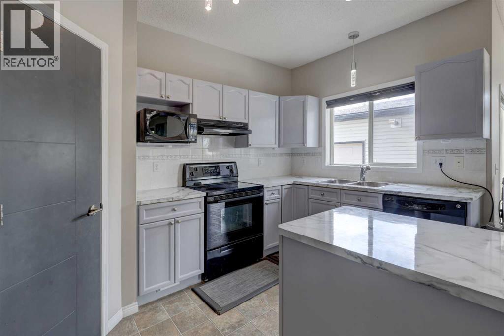 Photo 14 of 148 Stonegate Crescent Nw, Airdrie AB