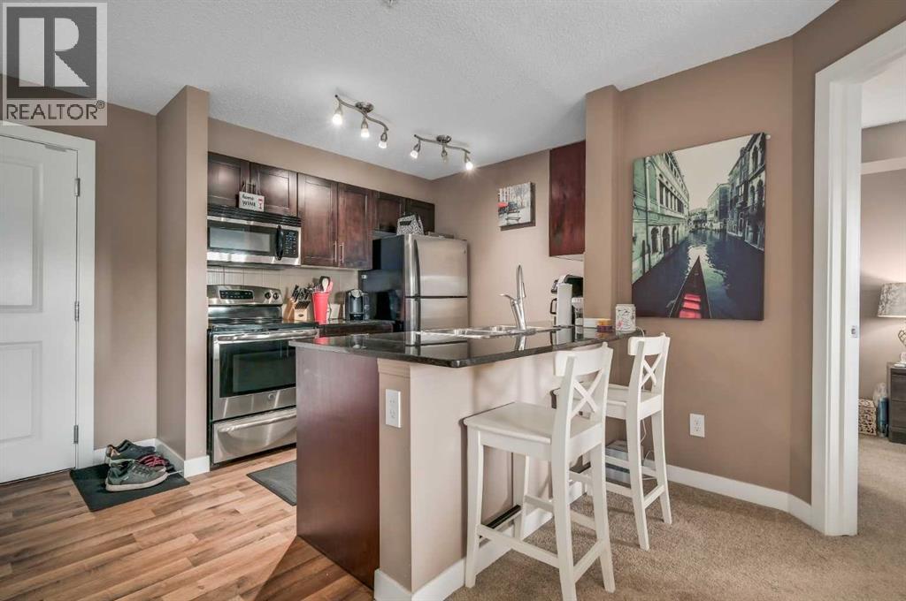 Photo 4 of 4317 403 Mackenzie Way Sw, Airdrie AB