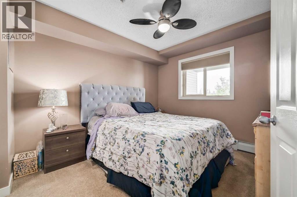 Photo 10 of 4317 403 Mackenzie Way Sw, Airdrie AB