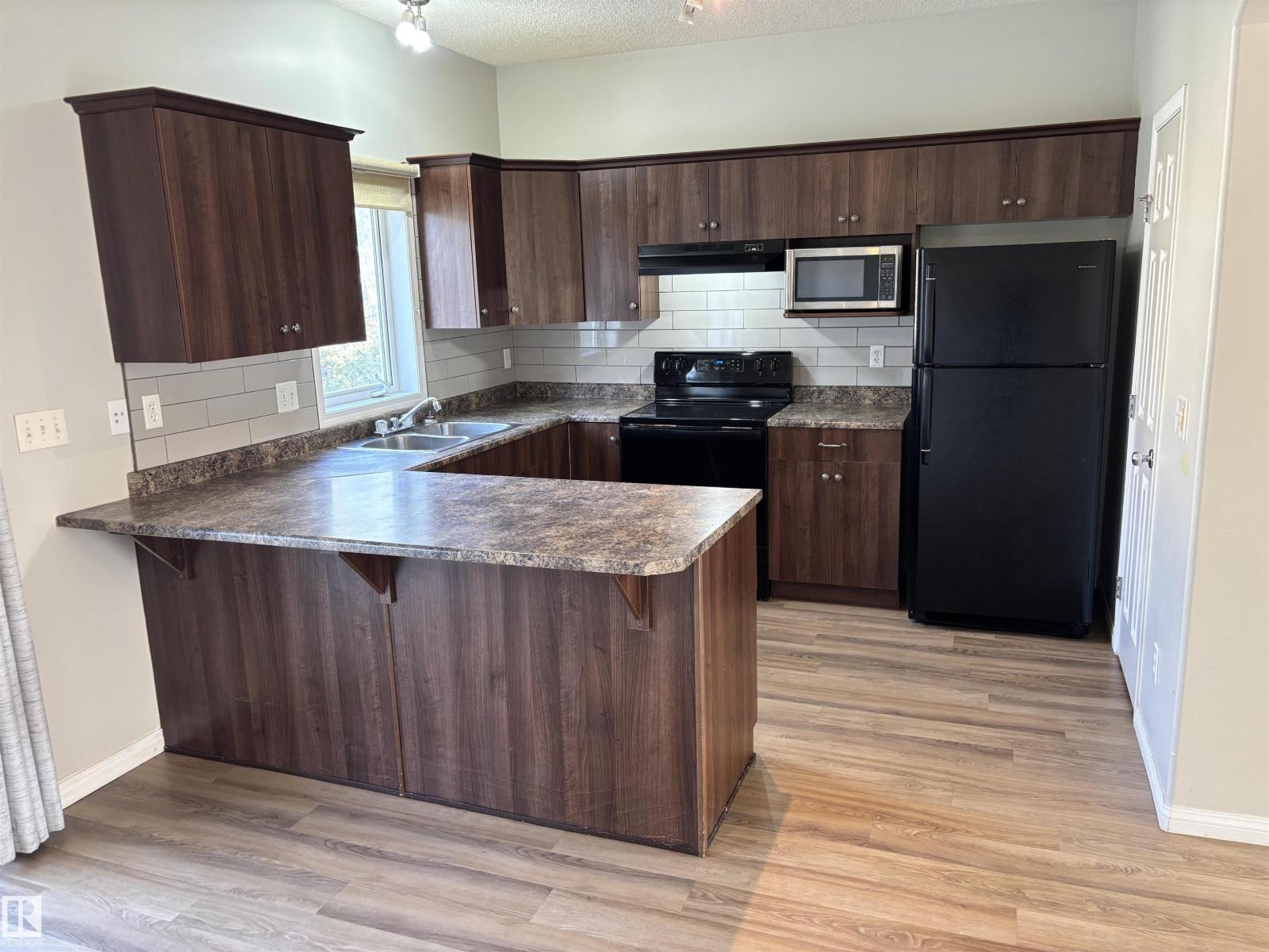 Photo 6 of 21 5102 30 Av, Beaumont AB