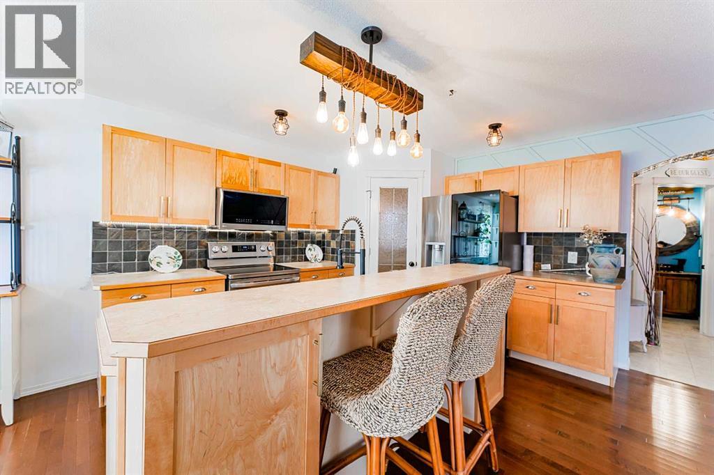 Photo 9 of 78 Kingsland Heights Se, Airdrie AB