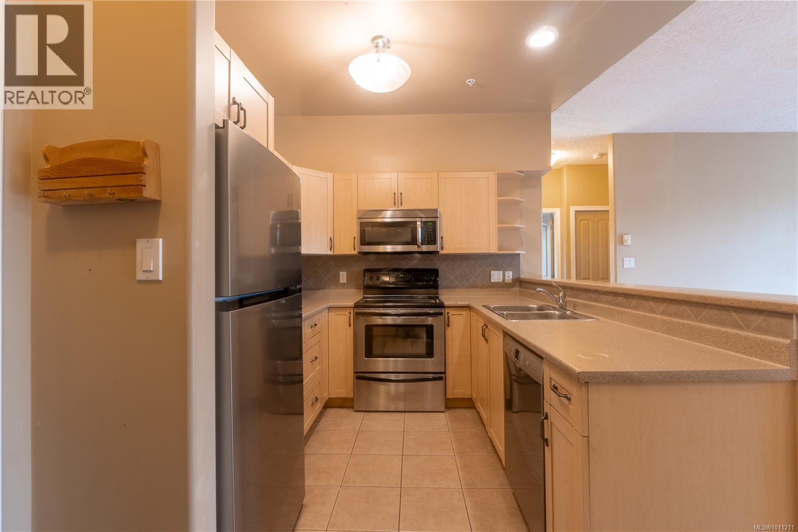 Photo 2 of 306 2706 Peatt Rd, Langford BC