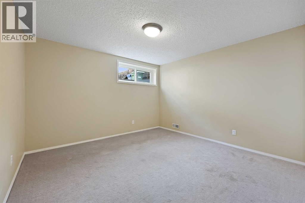 Single Family House Bungalow for Sale in  Prestwick Cove SE McKenzie Towne Calgary 
