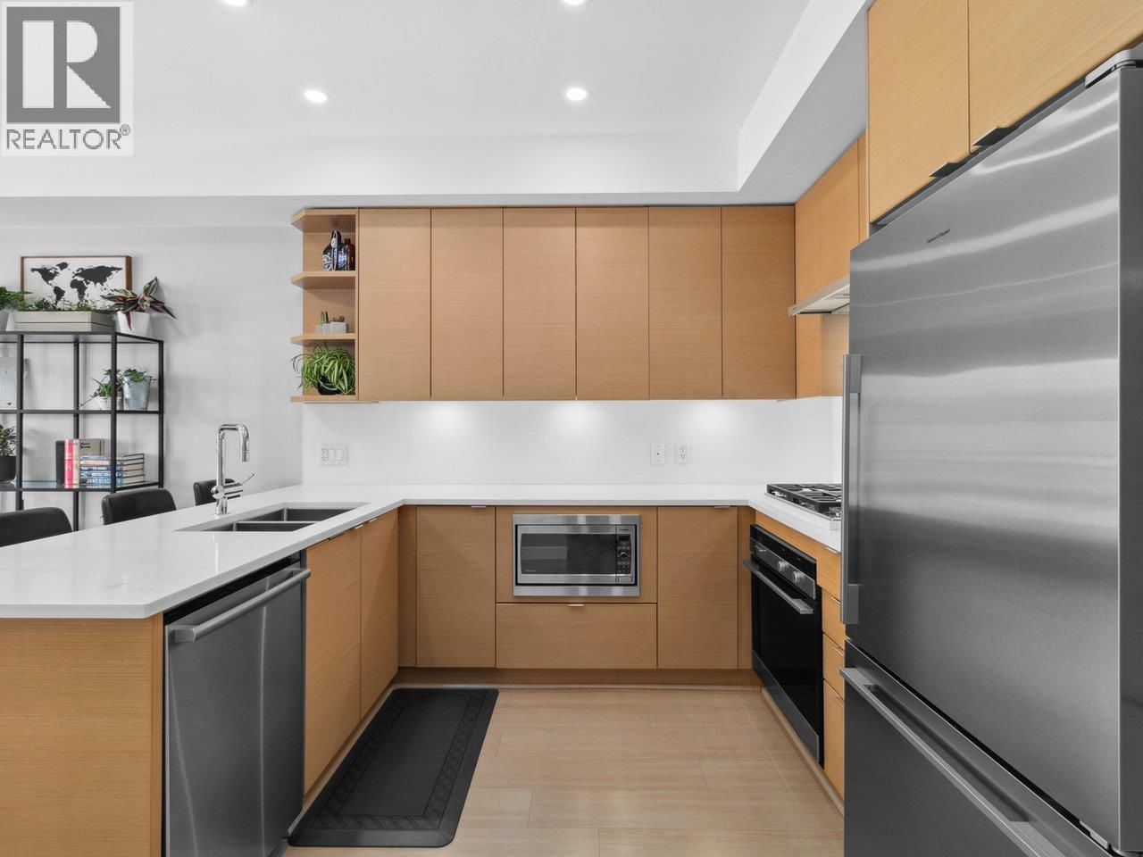Photo 1 of 208 2528 Collingwood Street, Vancouver BC