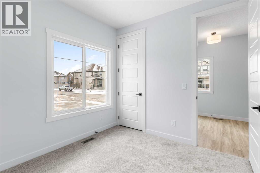 Photo 18 of 617 Baywater Manor Sw, Airdrie AB