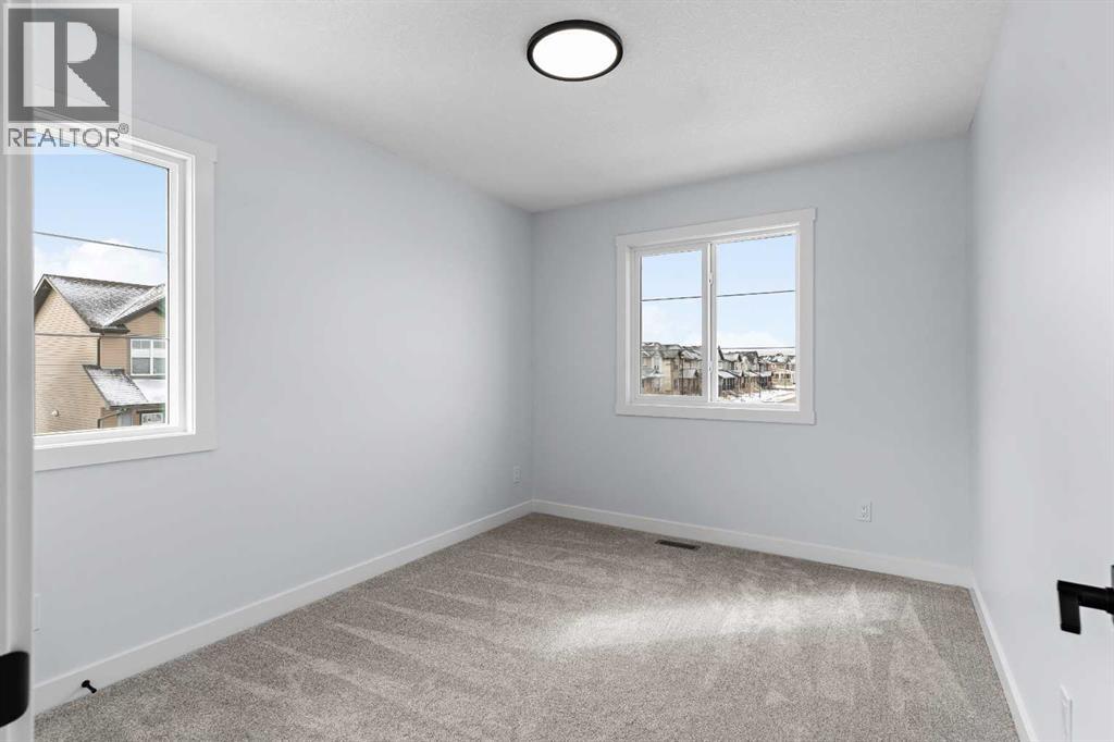 Photo 30 of 617 Baywater Manor Sw, Airdrie AB