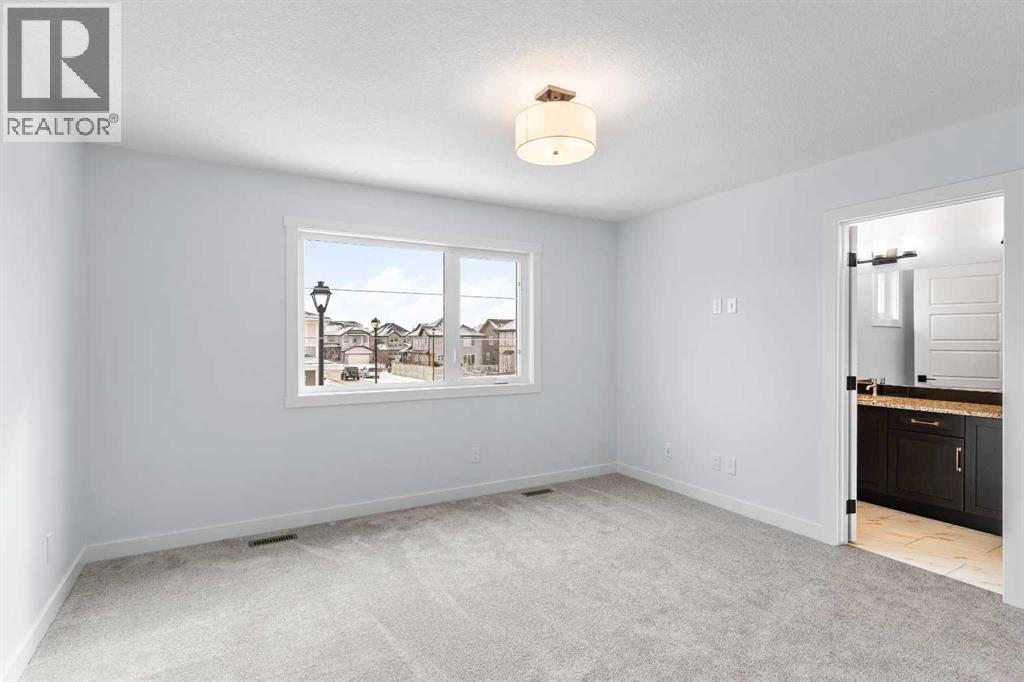 Photo 26 of 617 Baywater Manor Sw, Airdrie AB