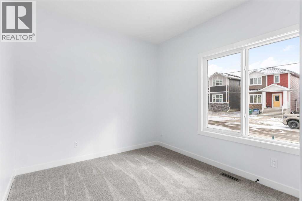 Photo 19 of 617 Baywater Manor Sw, Airdrie AB