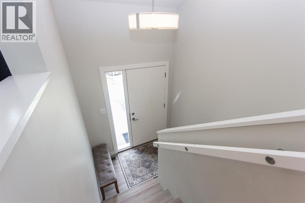 Single Family House Bi-level for Sale in  Ellington Crescent Evergreen Red Deer 