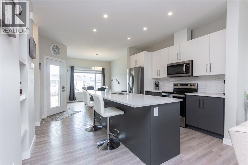 Single Family House Bi-level for Sale in  Ellington Crescent Evergreen Red Deer 