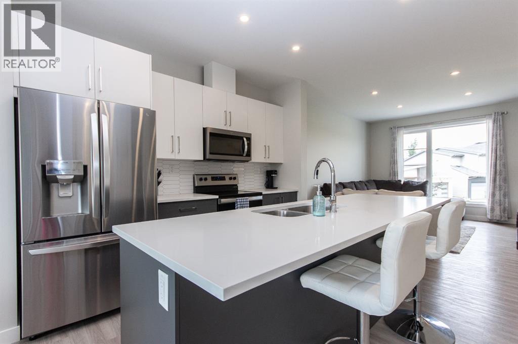 Single Family House Bi-level for Sale in  Ellington Crescent Evergreen Red Deer 
