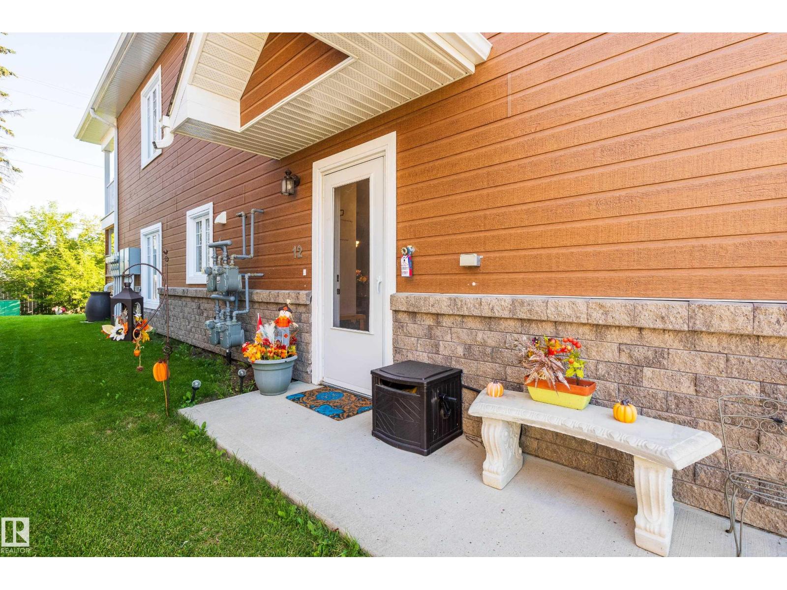 Photo 1 of 12 10105 101 Av, Morinville AB