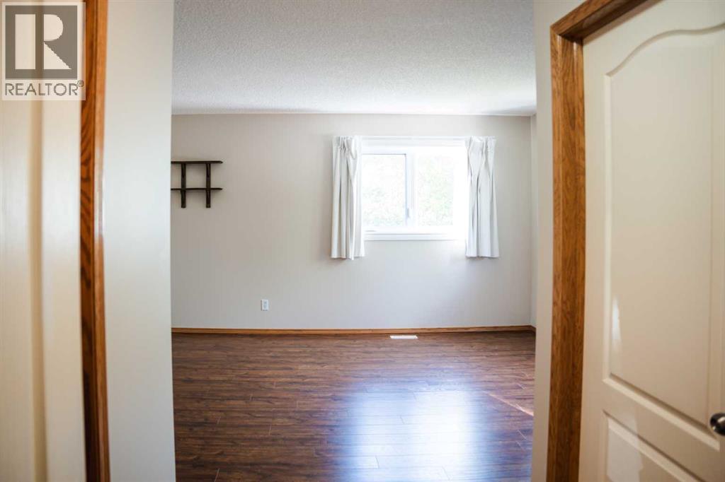 Photo 21 of 445 Rocky Ridge Bay Nw, Calgary AB