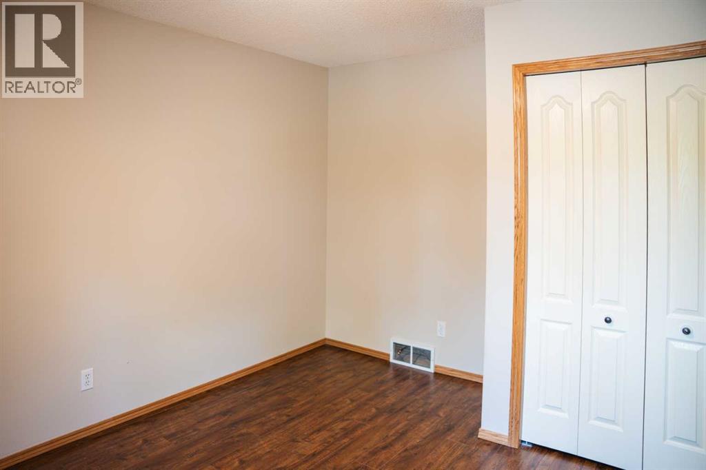 Photo 20 of 445 Rocky Ridge Bay Nw, Calgary AB