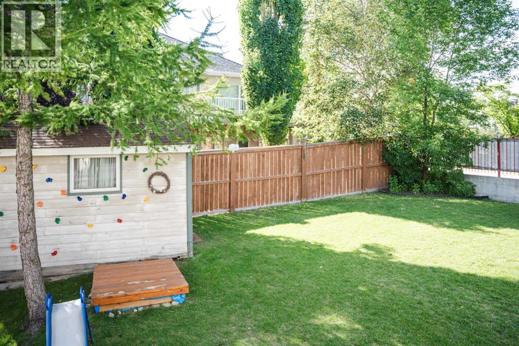 Photo 34 of 445 Rocky Ridge Bay Nw, Calgary AB