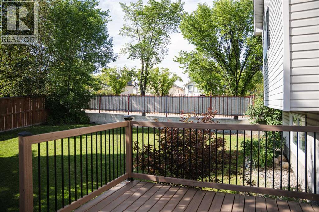 Photo 32 of 445 Rocky Ridge Bay Nw, Calgary AB
