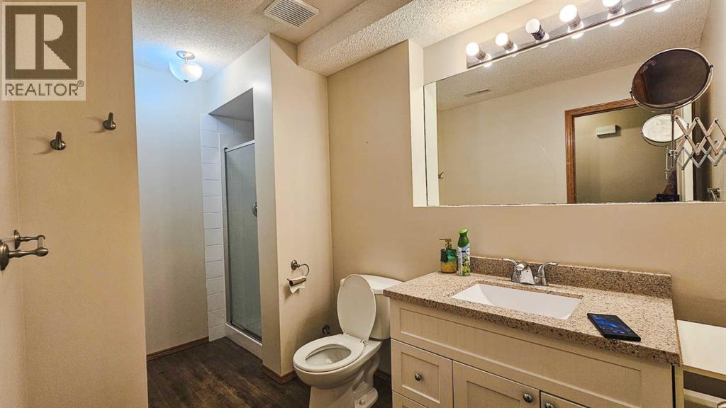 Photo 29 of 445 Rocky Ridge Bay Nw, Calgary AB