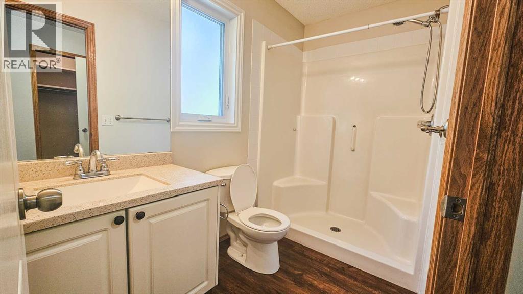 Photo 31 of 445 Rocky Ridge Bay Nw, Calgary AB
