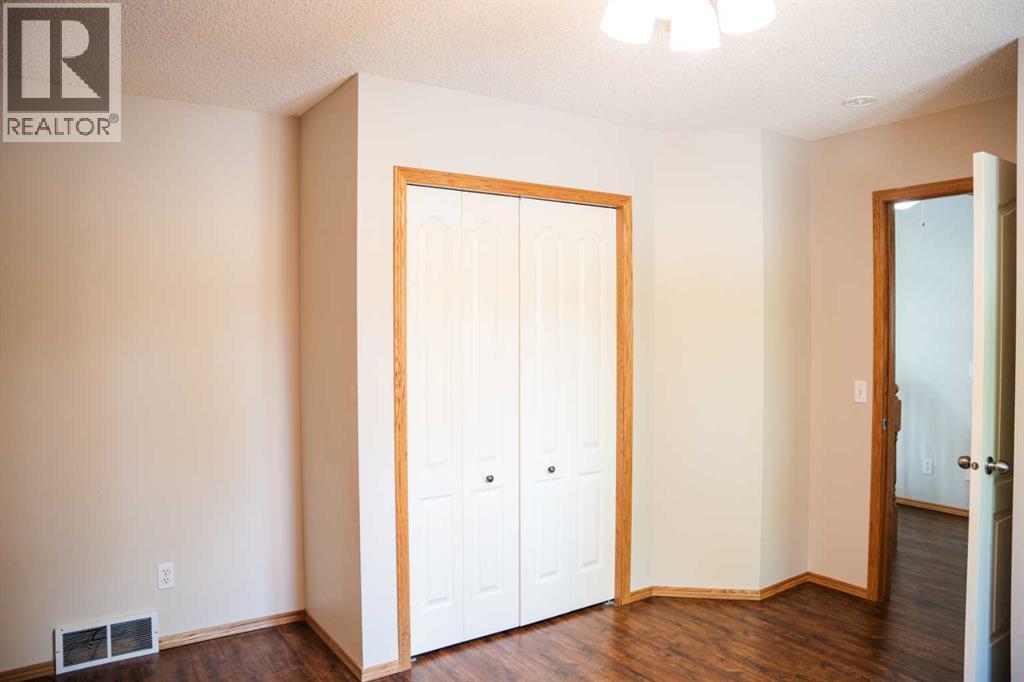 Photo 19 of 445 Rocky Ridge Bay Nw, Calgary AB