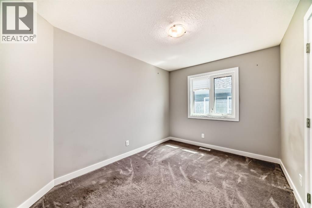 Photo 19 of 69 River Heights Drive, Cochrane AB