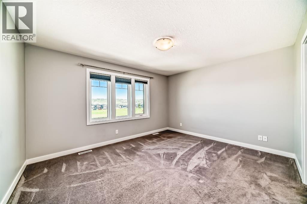 Photo 14 of 69 River Heights Drive, Cochrane AB