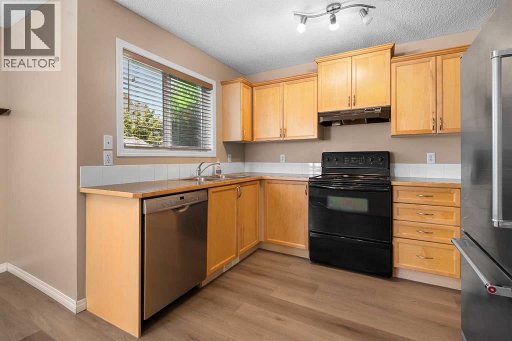 Photo 11 of 329 Bridleridge Way Sw, Calgary AB
