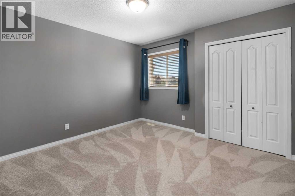 Photo 16 of 329 Bridleridge Way Sw, Calgary AB