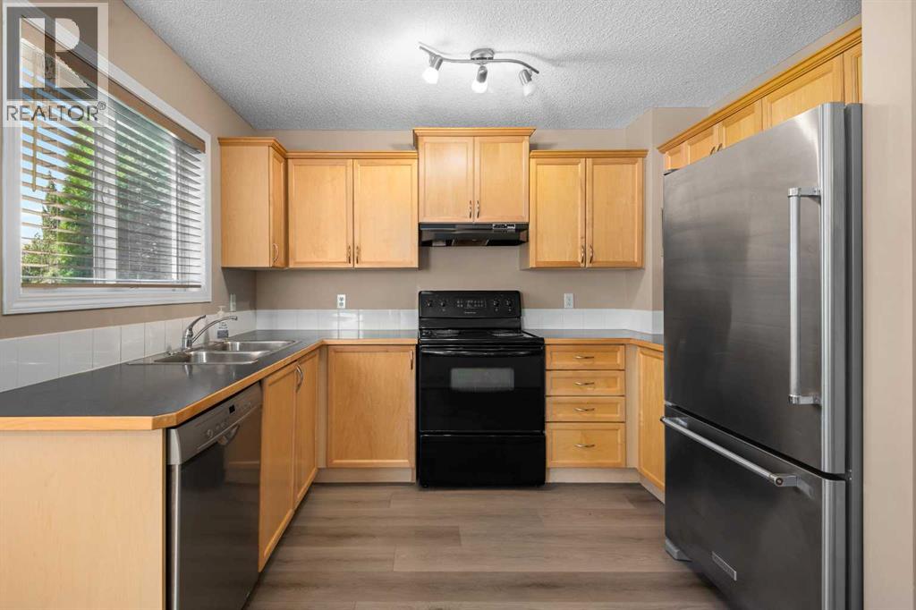 Photo 12 of 329 Bridleridge Way Sw, Calgary AB