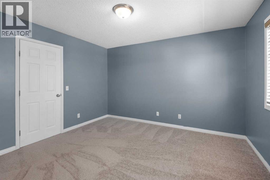 Photo 19 of 329 Bridleridge Way Sw, Calgary AB