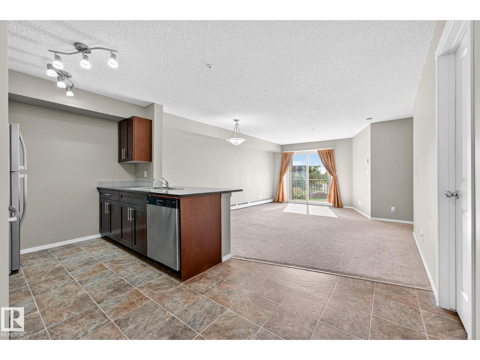 Photo 11 of 204 5810 Mullen Pl Nw, Edmonton AB