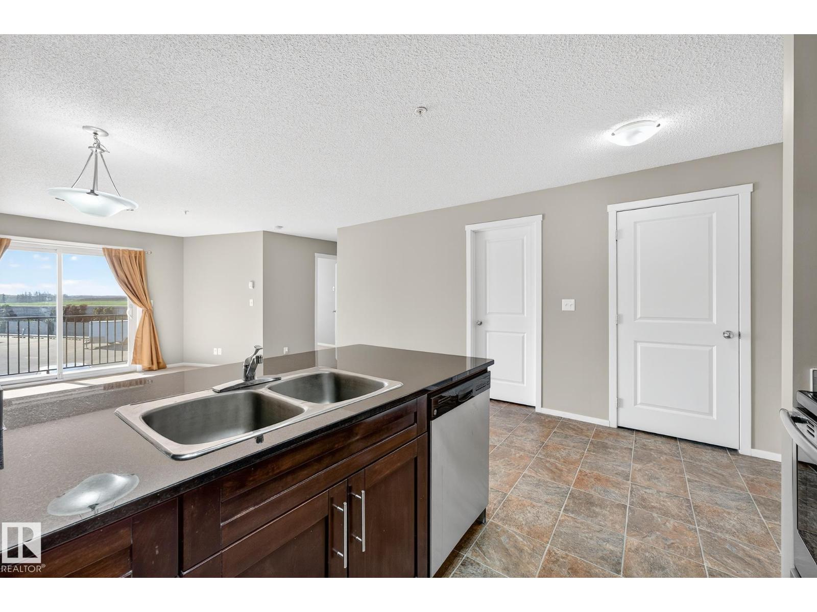 Photo 15 of 204 5810 Mullen Pl Nw, Edmonton AB
