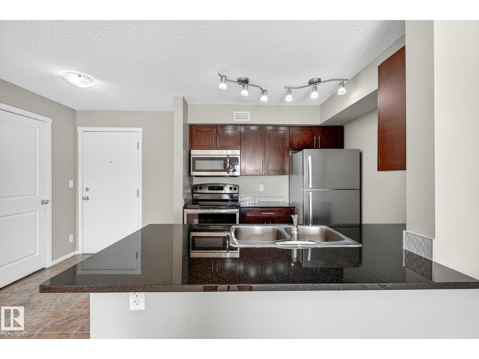 Photo 16 of 204 5810 Mullen Pl Nw, Edmonton AB