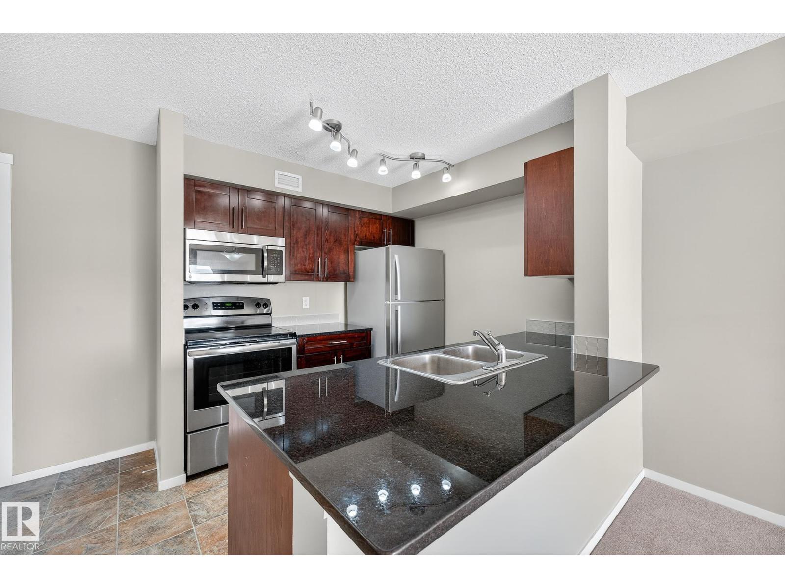 Photo 17 of 204 5810 Mullen Pl Nw, Edmonton AB