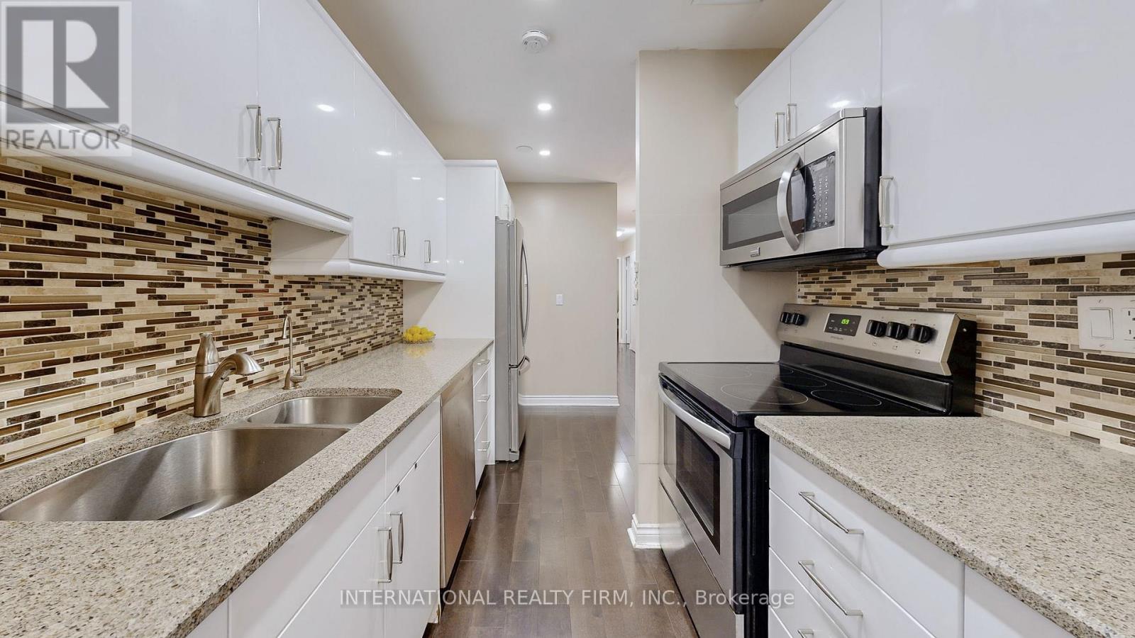 Photo 14 of 404 1200 Bridletowne Circle, Toronto ON