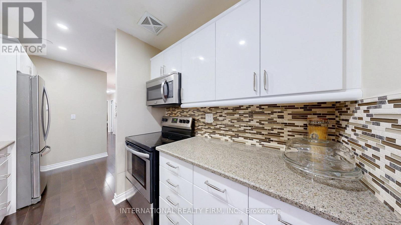 Photo 15 of 404 1200 Bridletowne Circle, Toronto ON