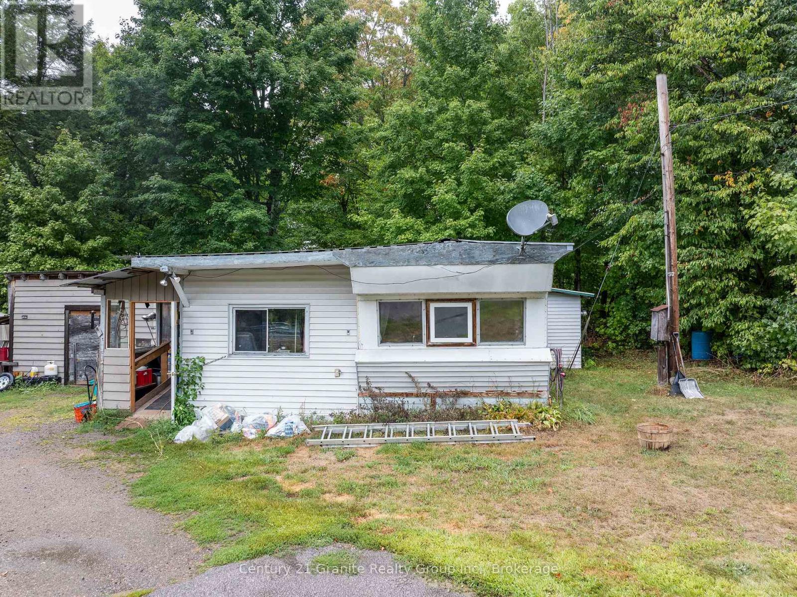 Photo 10 of 9564 Highway 118, Algonquin Highlands ON