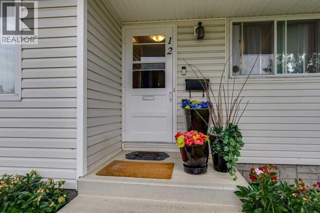 Photo 2 of 12 Mcphee Street, Red Deer AB